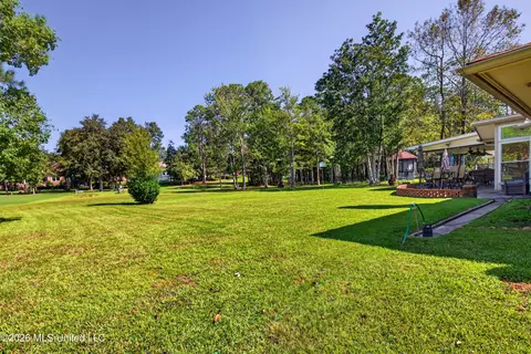 Exterior - 56113 E Diamondhead Dr, Diamondhead, MS 39525 photo 3 of 15