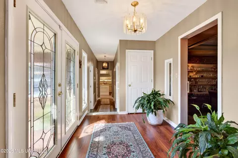 Entry Way - 56113 E Diamondhead Dr, Diamondhead, MS 39525 photo 1 of 2