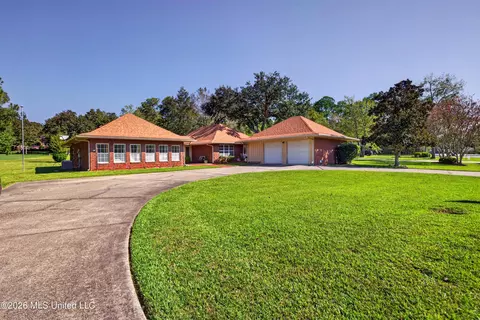 Exterior - 56113 E Diamondhead Dr, Diamondhead, MS 39525 photo 2 of 15