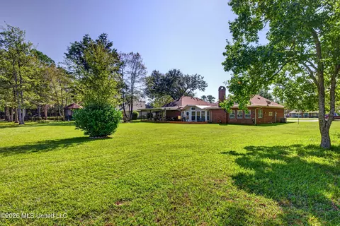 Exterior - 56113 E Diamondhead Dr, Diamondhead, MS 39525 photo 12 of 15