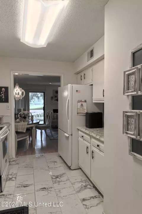 Kitchen - 294 Highpoint Dr, Diamondhead, MS 39525 photo 2 of 2