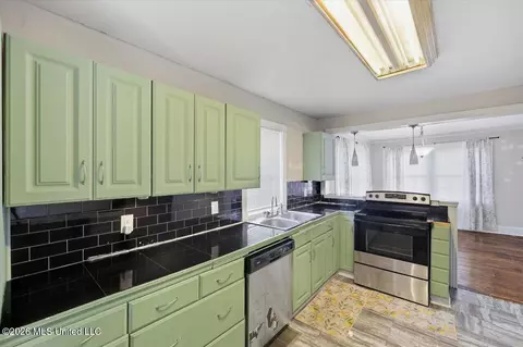 Kitchen - 106 3rd Avenue Southwest Ave, Magee, MS 39111 photo 2 of 2
