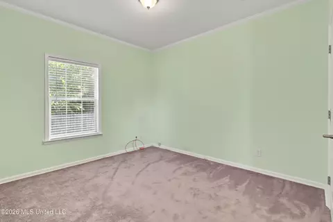 Bedroom - 410 E 2nd St, Pass Christian, MS 39571 photo 3 of 5