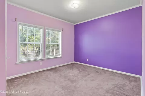 Bedroom - 410 E 2nd St, Pass Christian, MS 39571 photo 4 of 5