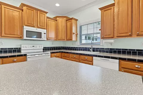 Kitchen - 410 E 2nd St, Pass Christian, MS 39571 photo 3 of 4