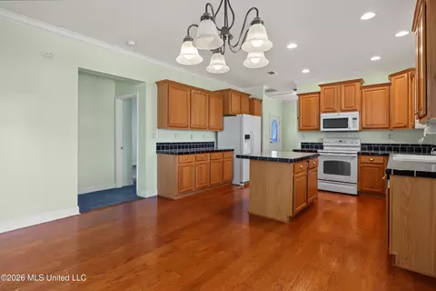 Kitchen - 410 E 2nd St, Pass Christian, MS 39571 photo 2 of 4