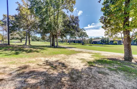 Exterior - 236 Fairway Villas Cir #E-2, Diamondhead, MS 39525 photo 7 of 8
