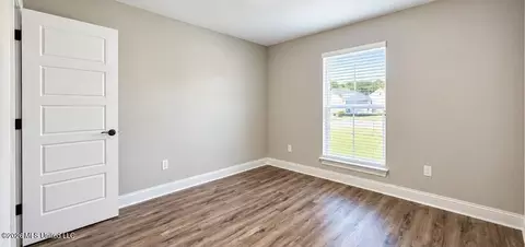Bedroom - 85064 Pohaku Dr, Diamondhead, MS 39525 photo 1 of 4