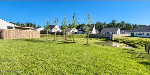 Exterior - 85064 Pohaku Dr, Diamondhead, MS 39525 photo 2 of 3