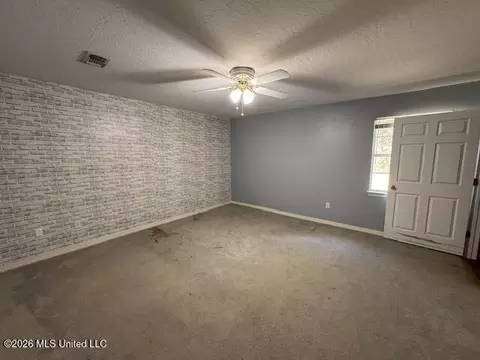 Living - 801 W 2nd Ave, Wiggins, MS 39577 photo 2 of 3