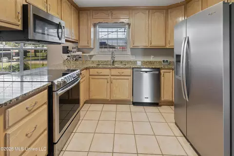 Kitchen - 10524 Maple St, Vancleave, MS 39565 photo 2 of 3