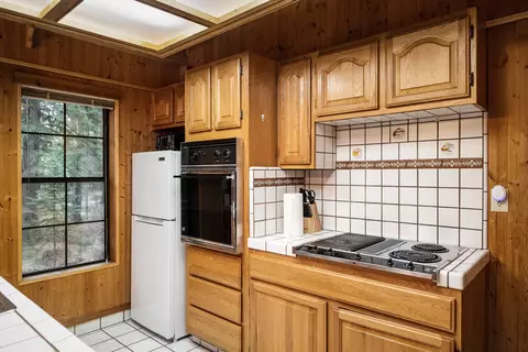 Kitchen - 3700 Glen Lake Rd, Eureka, MT 59917 photo 11 of 13