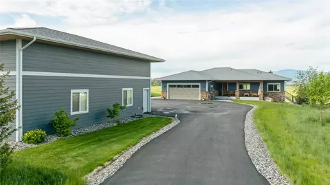Exterior - 160 Quirk Trl, Eureka, MT 59917 photo 2 of 11