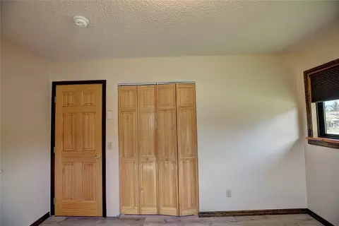Bedroom - 1108 9th St E, Polson, MT 59860 photo 4 of 9