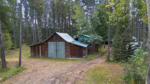 Exterior - 141 Lodge Ave, Coram, MT 59901 photo 1 of 16
