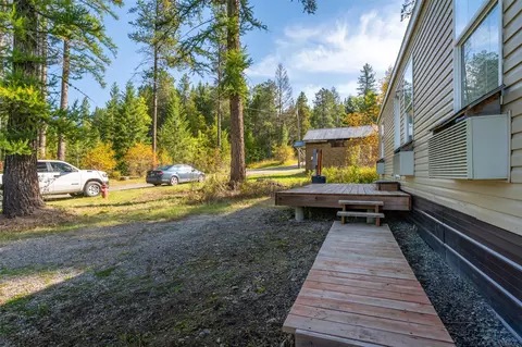 Exterior - 155 Corbett Ln, Coram, MT 59913 photo 7 of 14
