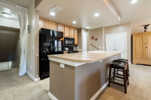 Kitchen - 6007 St Moritz Dr #D, Whitefish, MT 59937 photo 3 of 6