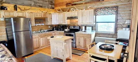 Kitchen - 747 Upper Ruby Rd, Alder, MT 59710 photo 1 of 9
