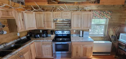 Kitchen - 747 Upper Ruby Rd, Alder, MT 59710 photo 5 of 9