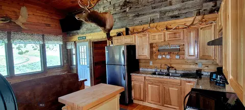Kitchen - 747 Upper Ruby Rd, Alder, MT 59710 photo 8 of 9