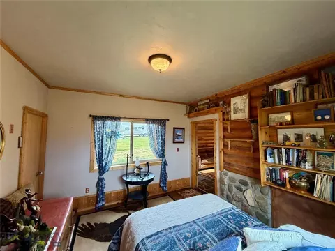 Bedroom - 448 Red Fox Rd, Wise River, MT 59762 photo 5 of 11