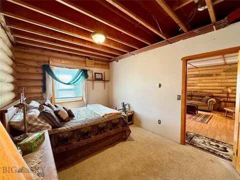 Bedroom - 448 Red Fox Rd, Wise River, MT 59762 photo 3 of 11