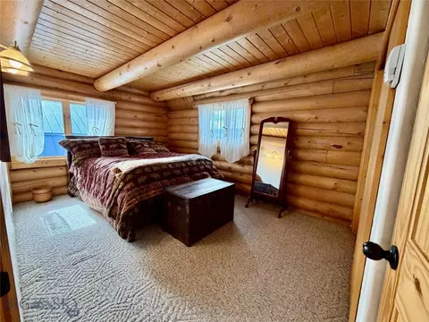 Bedroom - 448 Red Fox Rd, Wise River, MT 59762 photo 10 of 11