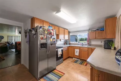 Kitchen - 1005 4th St W, Roundup, MT 59072 photo 2 of 2