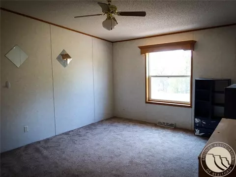 Bedroom - 2 Quail Trl, Roundup, MT 59072 photo 1 of 2