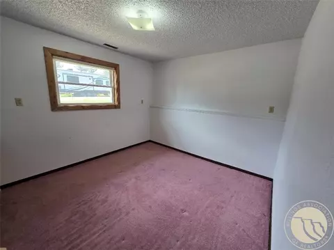 Bedroom - 309 W Kewanee Ave, Baker, MT 59313 photo 4 of 5