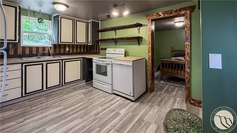 Kitchen - 526 6th St SE, Sidney, MT 59270 photo 2 of 2