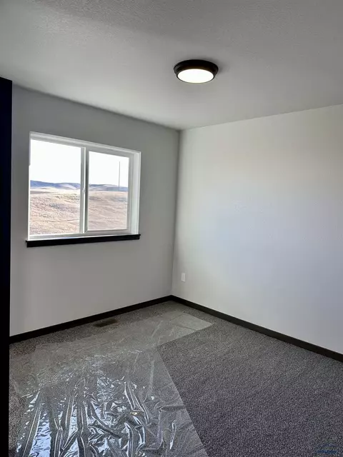Bedroom - 586 Denali Dr, Box Elder, SD 57719 photo 2 of 2
