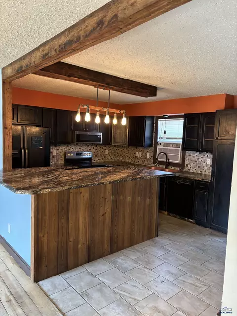 Kitchen - 7200 Diann Dr, Black Hawk, SD 57718 photo 1 of 2