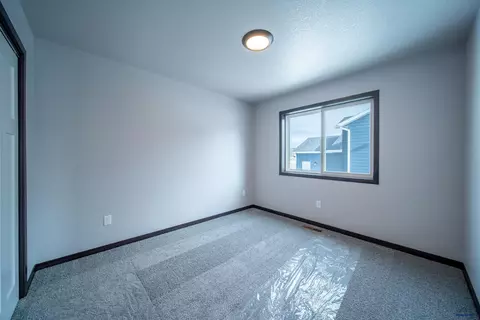 Bedroom - 1237 Kenai Dr, Box Elder, SD 57719 photo 2 of 5