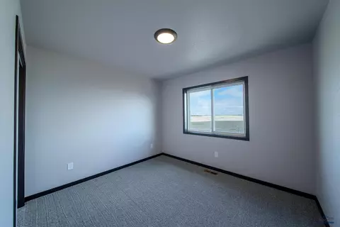 Bedroom - 425 Constitution Blvd, Box Elder, SD 57719 photo 1 of 8