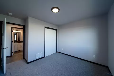 Bedroom - 425 Constitution Blvd, Box Elder, SD 57719 photo 2 of 8