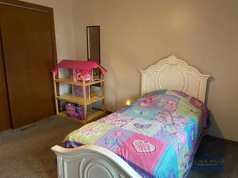 Bedroom - 104 Starling Ct, Box Elder, SD 57719 photo 2 of 5