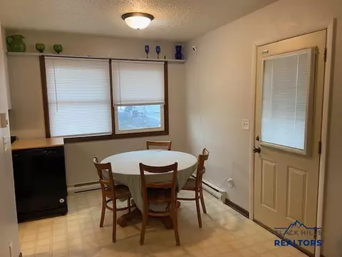 Dining - 104 Starling Ct, Box Elder, SD 57719 photo 1 of 2