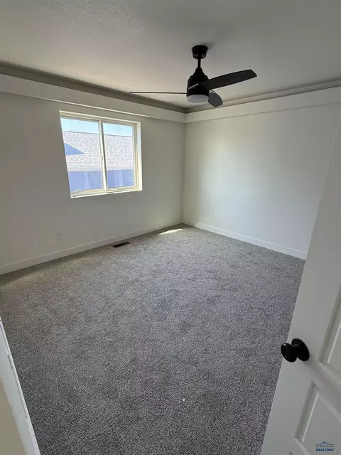 Bedroom - 672 Eagle Ct, Box Elder, SD 57719 photo 3 of 5