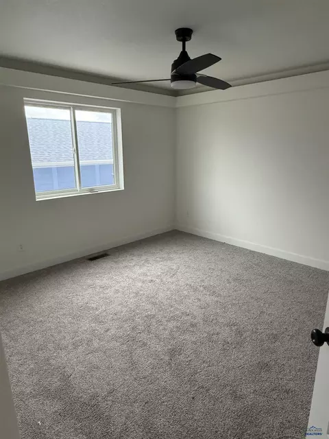 Bedroom - 672 Eagle Ct, Box Elder, SD 57719 photo 2 of 5