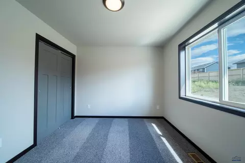 Bedroom - 1241 Kenai Dr, Box Elder, SD 57719 photo 1 of 5