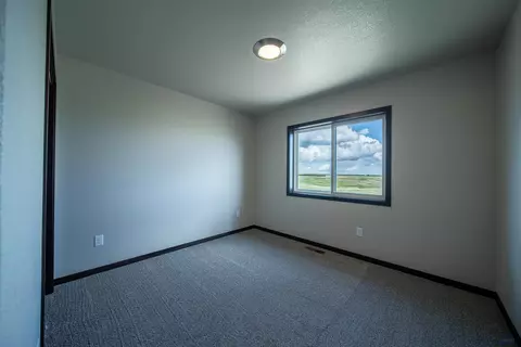 Bedroom - 417 Constitution Blvd, Box Elder, SD 57719 photo 2 of 7