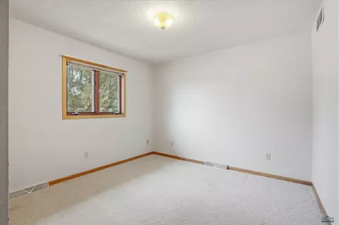 Bedroom - 611 Glenn St, Wall, SD 57790 photo 7 of 10