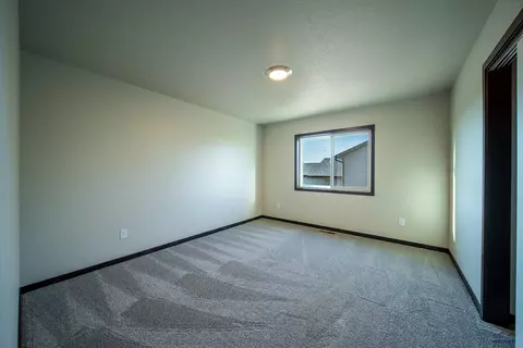 Bedroom - 409 Constitution Blvd, Box Elder, SD 57719 photo 4 of 7