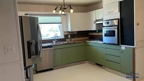 Kitchen - 1001 E St, Edgemont, SD 57735 photo 2 of 3