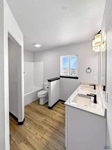Bath - 628 Bull Run Dr, Box Elder, SD 57719 photo 1 of 4
