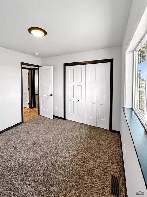Bedroom - 628 Bull Run Dr, Box Elder, SD 57719 photo 2 of 3