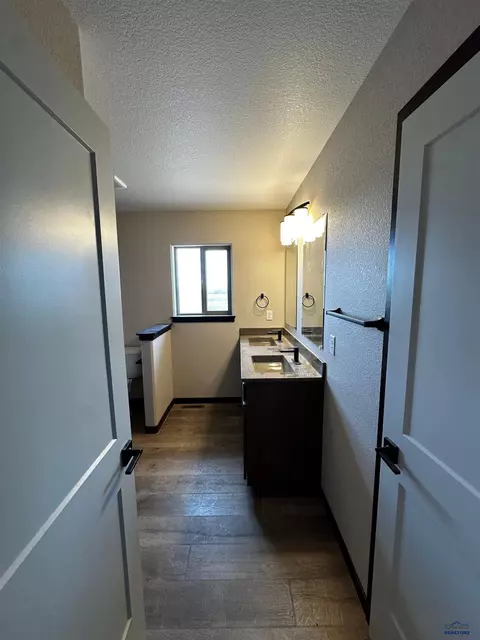 Bath - 620 Bull Run Dr, Box Elder, SD 57719 photo 1 of 4