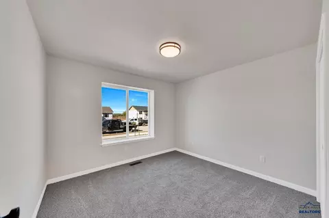Bedroom - 460 Alpha Ave, Box Elder, SD 57719 photo 3 of 5