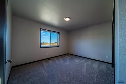 Bedroom - 627 Bull Run Dr, Box Elder, SD 57719 photo 2 of 4